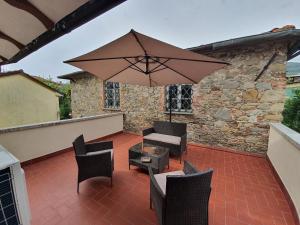Patio nebo venkovní prostory v ubytování Villa con piscina tra Versilia e Cinque Terre