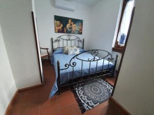 Postel nebo postele na pokoji v ubytování Villa con piscina tra Versilia e Cinque Terre