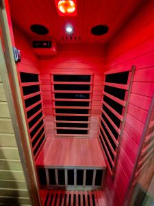 a red room with a red ceiling at b&b dolce casa con Sauna e cromoterapia in Domodossola