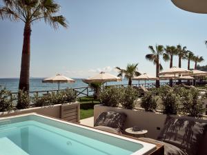 A view of the pool at Windmill Bay Hotel or nearby