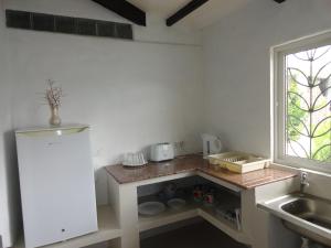 A cozinha ou kitchenette de Lazare Picault Hotel