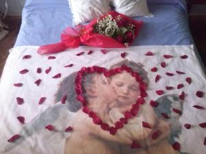 A bed or beds in a room at Holiday Home La Casetta delle Candele