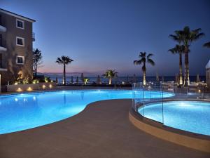 The swimming pool at or close to Windmill Bay Hotel