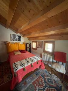 En eller flere senge i et værelse på La Casa del Glicine