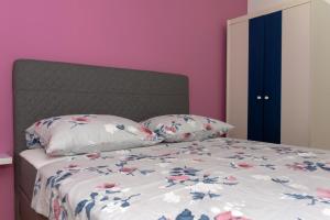 Giường trong phòng chung tại Apartment Plazonić