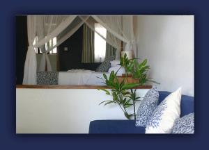 Posezení v ubytování L'Hirondelle Self Catering Guest House