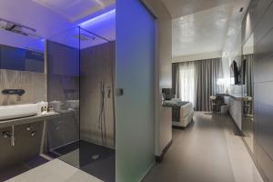 Kopalnica v nastanitvi Caportigia Boutique Hotel