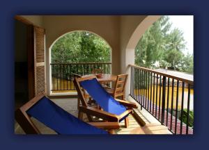 Balkón nebo terasa v ubytování L'Hirondelle Self Catering Guest House
