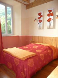 Letto o letti in una camera di Gite la Fargue de Cabre