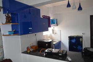 Dapur atau dapur kecil di Oviyam Sea view Apartment, feel like home