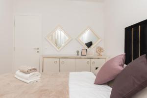 Postel nebo postele na pokoji v ubytování Luxury Apartment SMILE