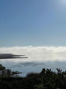 a view of a body of water with clouds in the sky at Apartament La Terrasse in Sarichioi