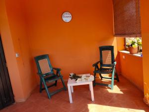 A seating area at Villa dei Ginepri