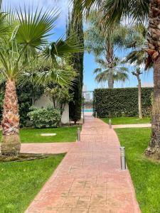 Fotografie z fotogalerie ubytování Lovely 3-bedroom townhouse with shared pool v destinaci Estepona
