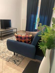 Televízia a/alebo spoločenská miestnosť v ubytovaní SnD Rentals -Boutique apartments