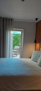 Giường trong phòng chung tại Hotel Amadora Palace