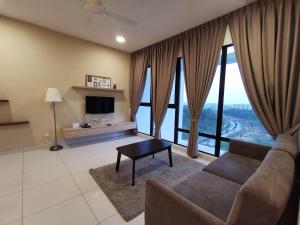 Et sittehjørne på Mid Valley Southkey Mosaic Cozy Suite at Johor Bahru