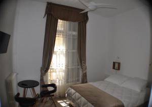 Postel nebo postele na pokoji v ubytování Ida Chambres d'hôtes B&B