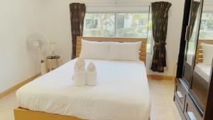 Легло или легла в стая в 3 Bedroom Villa Praitumnak soi 4 by Zoom Pattaya