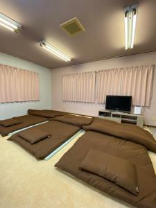 Fotografie z fotogalerie ubytování Big Island Base ビッグアイランドベースPrivate Villa with Outdoor Sauna and BBQ 伊豆大島 貸切 v destinaci Oshima