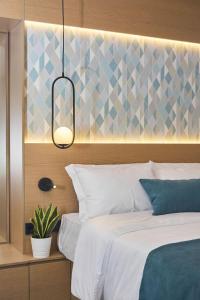 Posteľ alebo postele v izbe v ubytovaní 7Rizes Luxury Living
