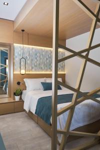 Posteľ alebo postele v izbe v ubytovaní 7Rizes Luxury Living