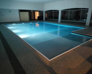 The swimming pool at or close to Hôtel Causse Comtal Rodez, The Originals Relais