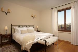 Ένα ή περισσότερα κρεβάτια σε δωμάτιο στο Malipiero Estate - Villa and Cottage +26 φωτογραφίες