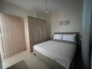 Postel nebo postele na pokoji v ubytování Nastazia