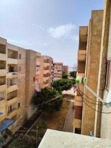 an overhead view of a city with buildings at شقه 115متر سوبر لوكس العامريه قريبه من الاسكندريه10min from Alexanderia in ‘Izbat al Musta‘marah