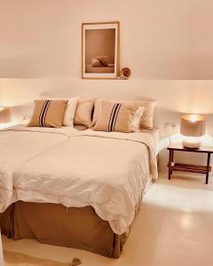 Tempat tidur dalam kamar di Villa Nepenthe