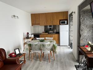 Η κουζίνα ή μικρή κουζίνα στο Casa do Craveiro +5 φωτογραφίες