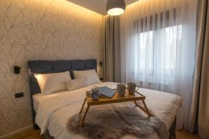 Postel nebo postele na pokoji v ubytování Apartman Čari na Tari