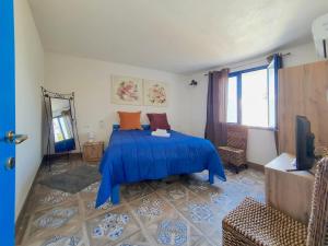 Un pat sau paturi într-o cameră la Villa Nica