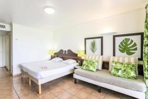 Letto o letti in una camera di Vacances972 Conceptmultishop logement à Pierre et Vacances