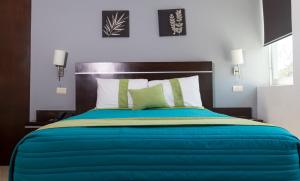 Postel nebo postele na pokoji v ubytování Hotel Misión Express Xalapa + 20 fotografií