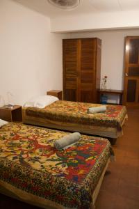 Cama o camas de una habitación en Hostel Tajalín