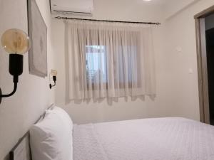 Postel nebo postele na pokoji v ubytování Kali Luxury Apartments -Garden-Gold-