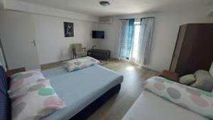 Katil atau katil-katil dalam bilik di Apartment Boras