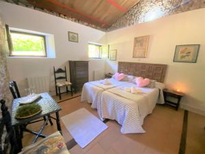 Postel nebo postele na pokoji v ubytování La Casa Gotica - 5815