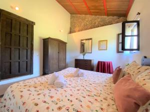 Postel nebo postele na pokoji v ubytování La Casa Gotica - 5815