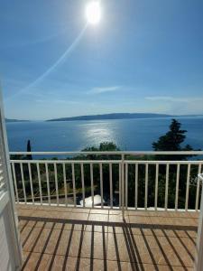 a view of the ocean from a balcony at Apartment Boras in Senj