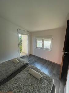 Postel nebo postele na pokoji v ubytování Vracar Apartment