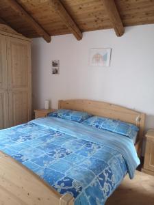 Llit o llits en una habitació de Agritur Maso Gosserhof