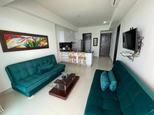 Televizorius ir (arba) pramogų centras apgyvendinimo įstaigoje Playa Cartagena Apartments