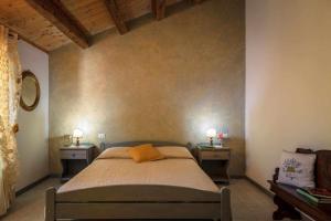 En eller flere senger på et rom på La Meriggia Senigallia