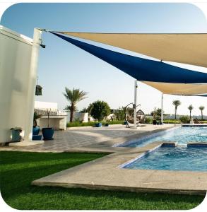 Bazén v ubytování Luxury Farm Villa in Musanaa Oman nebo v jeho okolí + 24 fotografií