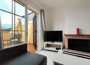 TV a/nebo společenská místnost v ubytování Casa Sócrates by Spainsunrentals