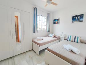 Ein Bett oder Betten in einem Zimmer der Unterkunft Casa Sócrates by Spainsunrentals