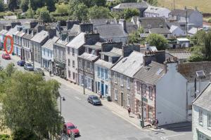 an aerial view of a town with houses and a street at Holiday House at 22, 3 bedroom cottage in historic Wigtown in Wigtown